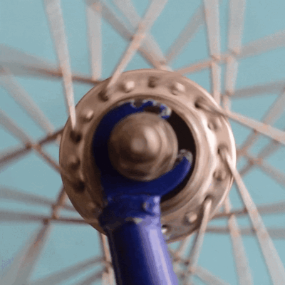 Bike wheels spinning to show our delivery options 