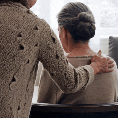 Person viewing a order of service funeral program